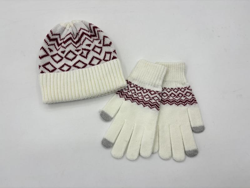 Cream knit winter hat and matching touchscreen gloves with burgundy geometric Fair Isle pattern on white background
