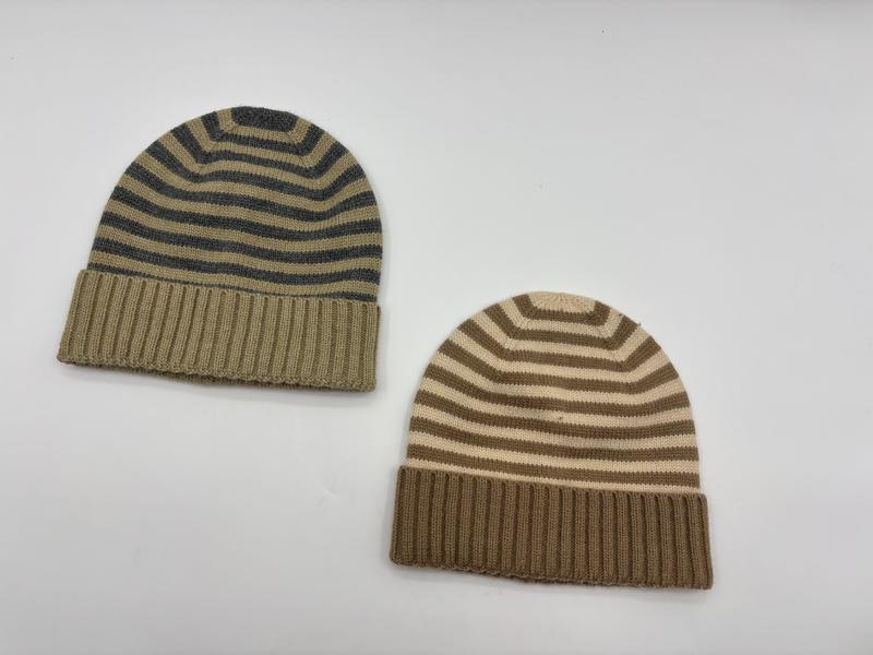 Two striped knit beanie hats with ribbed cuffs in khaki-grey and camel-cream colorways on white background