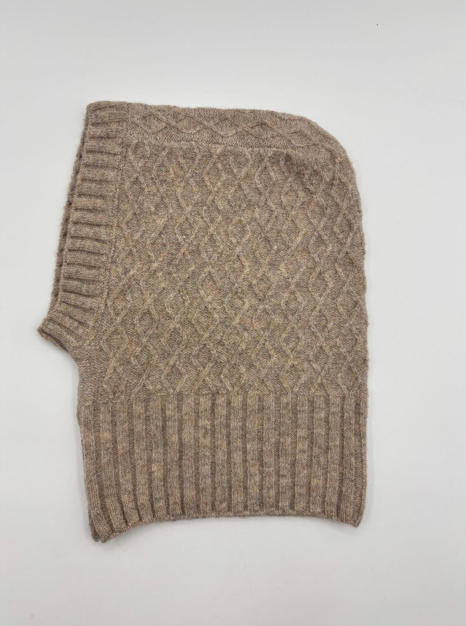 Taupe cable knit wool balaclava with diamond lattice and ribbed stripe pattern laid flat on white background