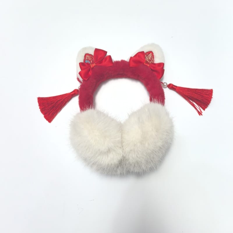 Pair of taupe brown sherpa fleece ear muffs with black velvet headband on white background