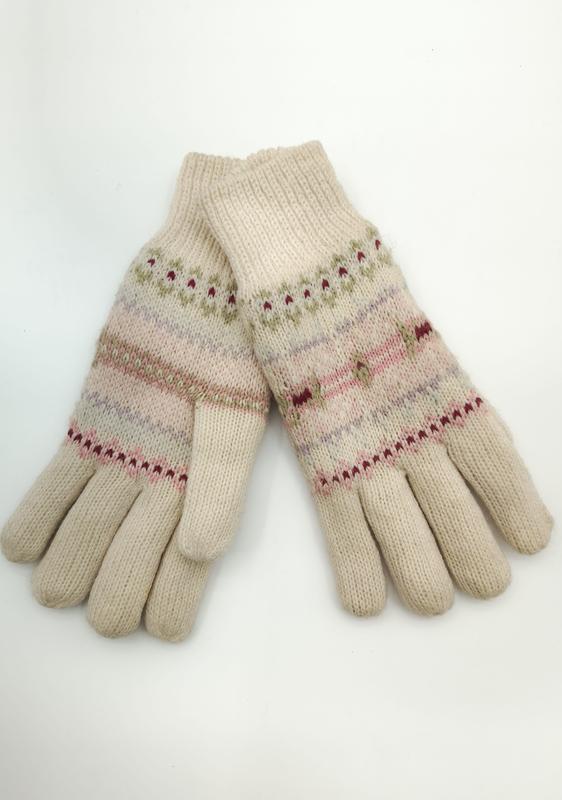 Pair of cream knitted Fair Isle gloves with pink, burgundy, and sage green patterned bands on white background