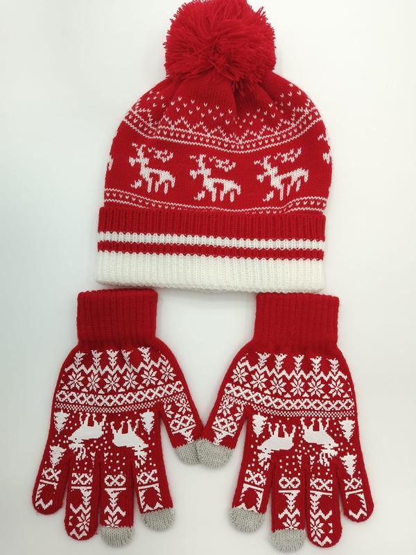 Red and white Fair Isle knit winter hat with pom-pom and matching reindeer gloves set on white background
