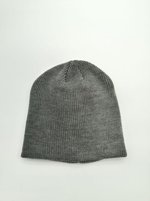 Flat lay of a heather gray ribbed knit beanie hat on white background, showing fine knit texture and tapered crown