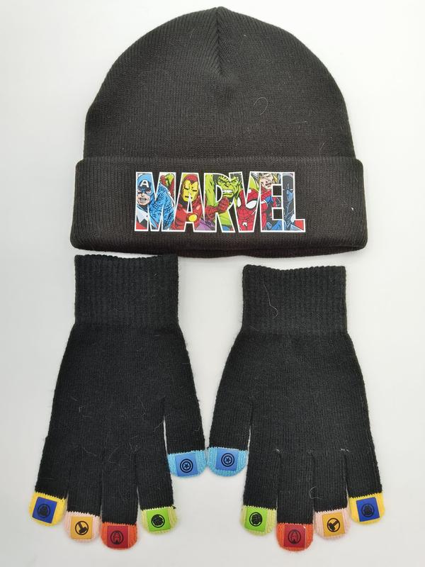 Black knitted beanie hat with Marvel superhero logo and matching fingerless gloves with colorful character fingertips, laid flat on white background
