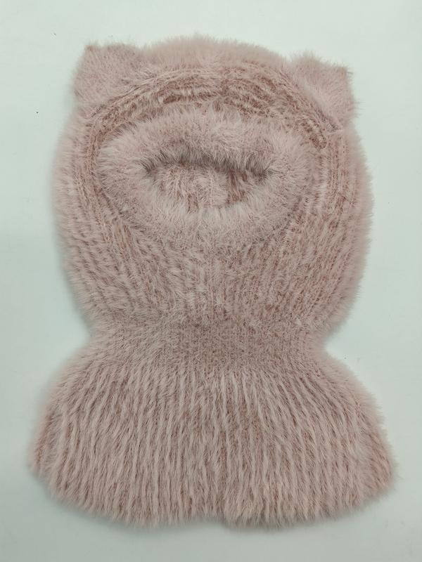 Blush pink fuzzy knit balaclava with cat ears and ribbed neck warmer, laid flat on white background